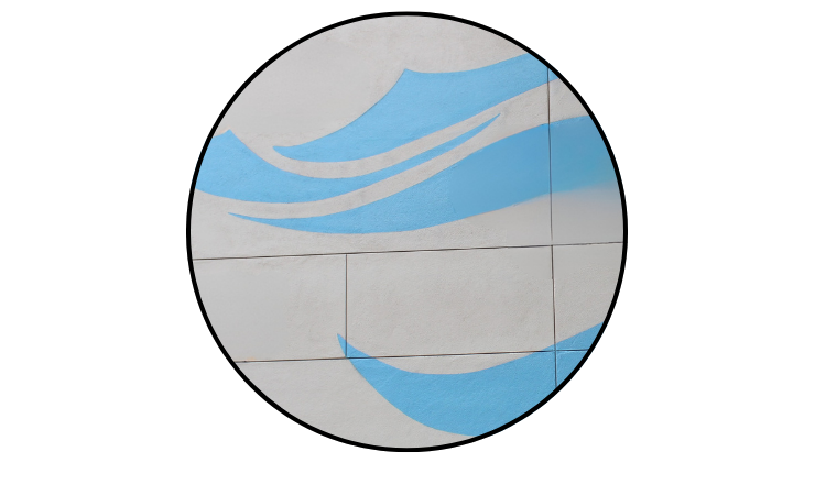 Close-up photo of the ocean wave graphic on the Prueter Library Mural