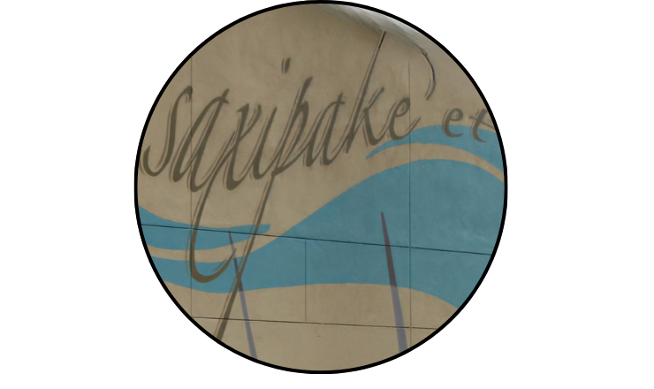 Close-up photo of the Chumash word "Saxipake'et" on the Prueter Library Mural