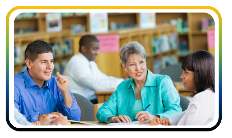 Adults talking in Library