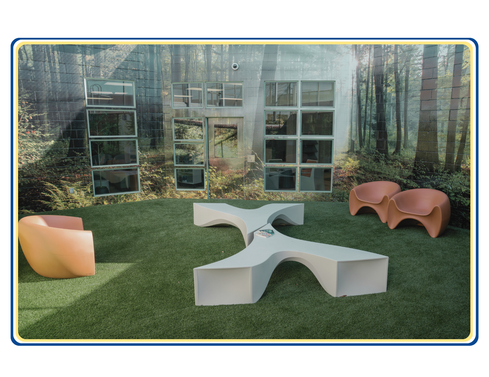 Photo showing outdoor space adjacent to Next Chapter Library with tables and chairs