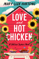 Image for "Love and Hot Chicken" Red barn surrounded by four sunflowers with table set with food in the foreground.
