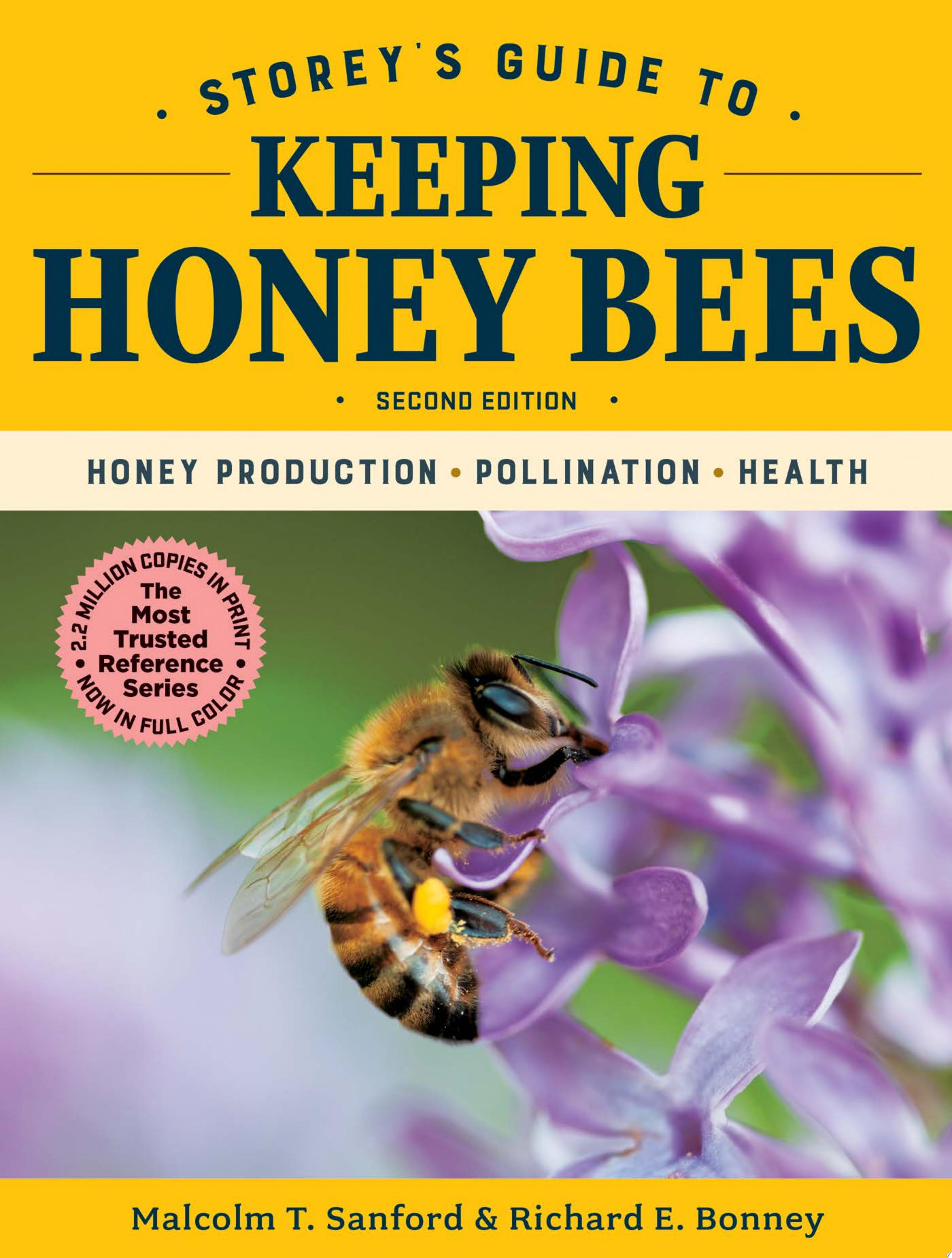 Image for "Storey&#039;s Guide to Keeping Honey Bees, 2nd Edition" Close up photo of a bees collecting pollen on a purple flower