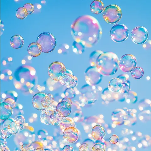 bubbles lit up against a blue sky