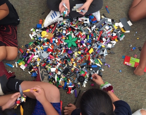 Photo of lego children and lego bricks