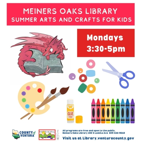 Colorful craft supplies and a pink dragon