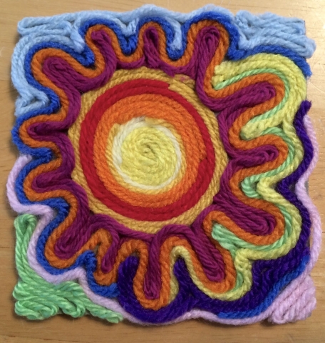 Mexican Huichol yarn painted colorful sun