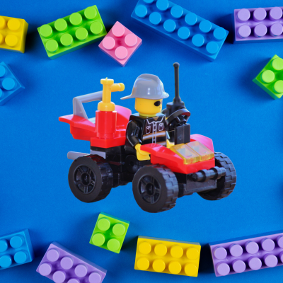 Lego car with a border of legos