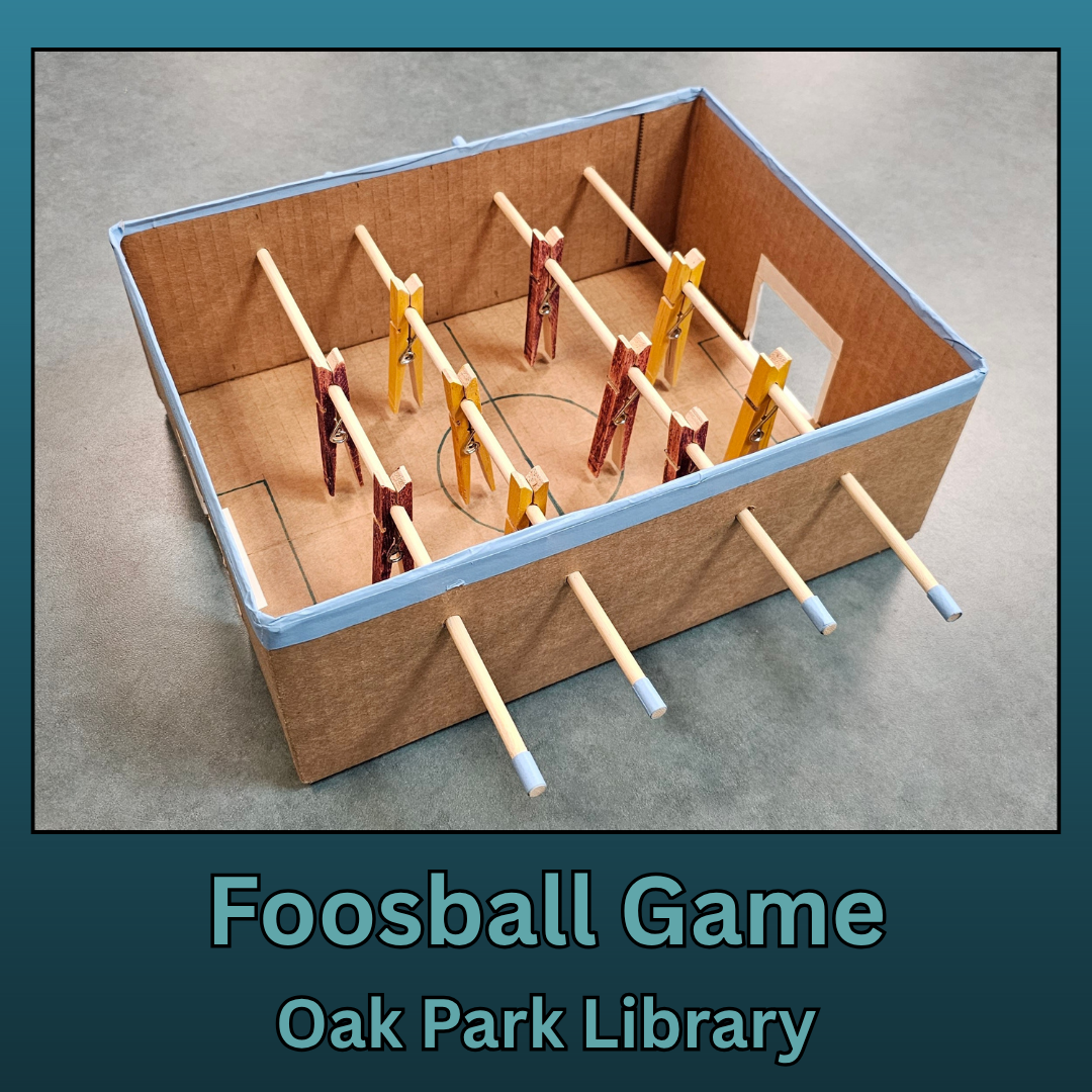 Image of a shoebox Foosball Game with clothespins - Oak Park Library