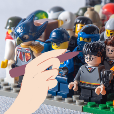lego minifigures with a hand drawing on them